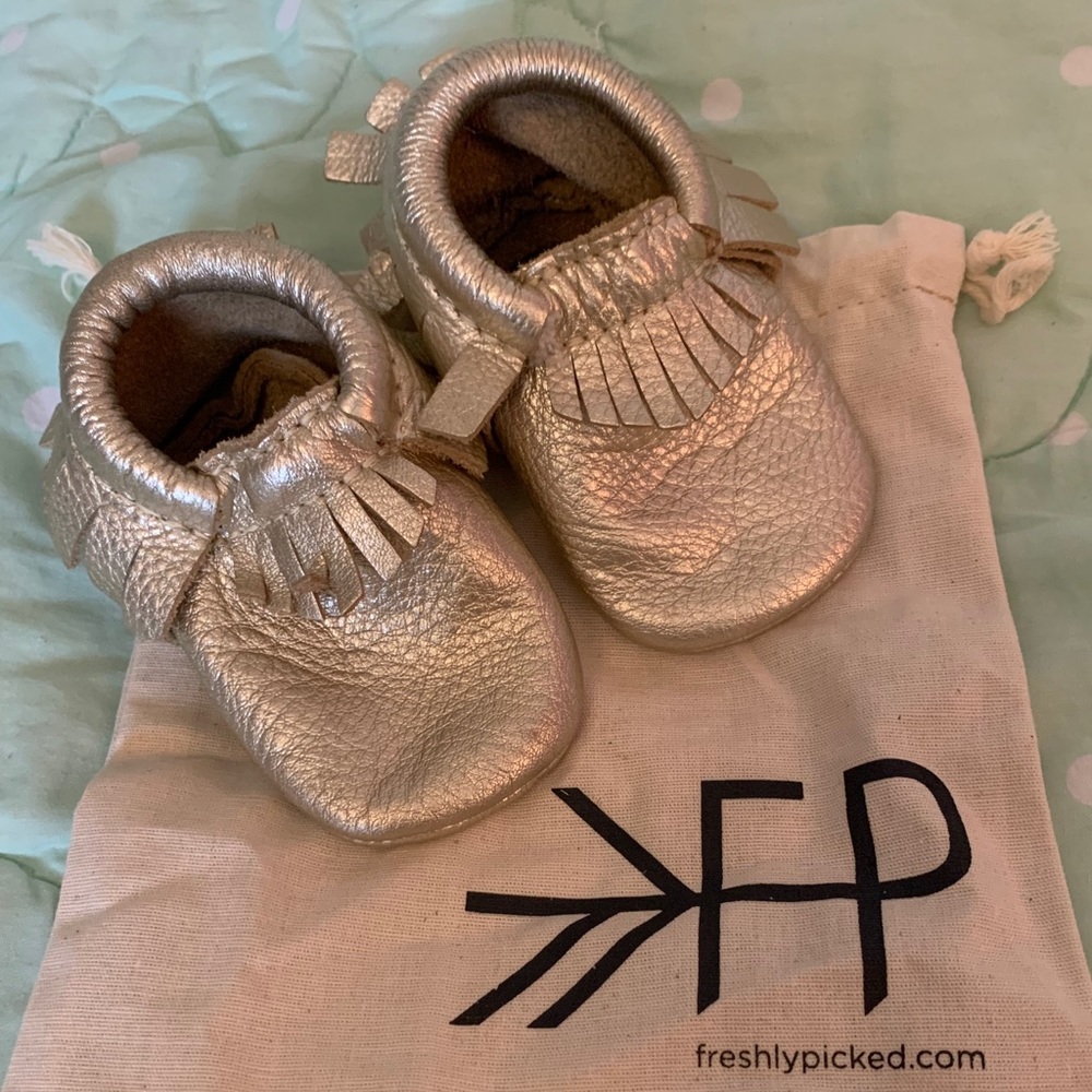 Freshly pocked platinum size 2 moccasins